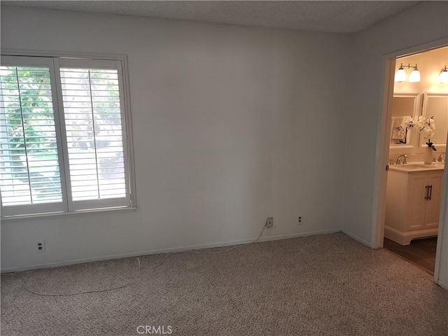 17077 Los Modelos St, Fountain Valley, CA 92708 - spare room with light colored carpet and healthy amount of natural light