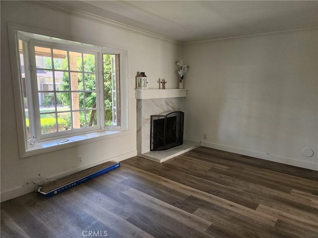 17077 Los Modelos St, Fountain Valley, CA 92708 - unfurnished living room with ornamental molding, a premium fireplace, and dark wood finished floors