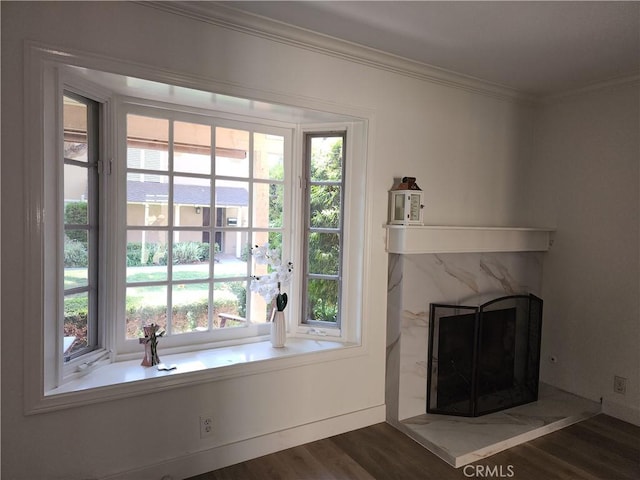 17077 Los Modelos St, Fountain Valley, CA 92708 - unfurnished living room featuring crown molding, dark wood-style floors, a high end fireplace, and plenty of natural light