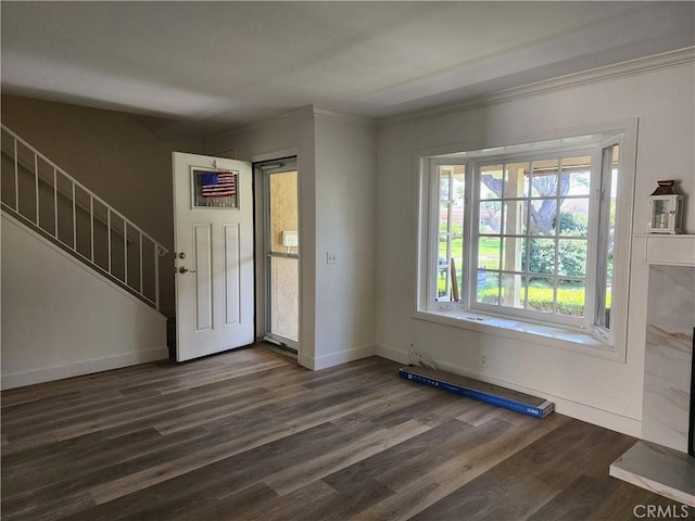 17077 Los Modelos St, Fountain Valley, CA 92708 - foyer entrance featuring dark wood-style floors, crown molding, and healthy amount of natural light