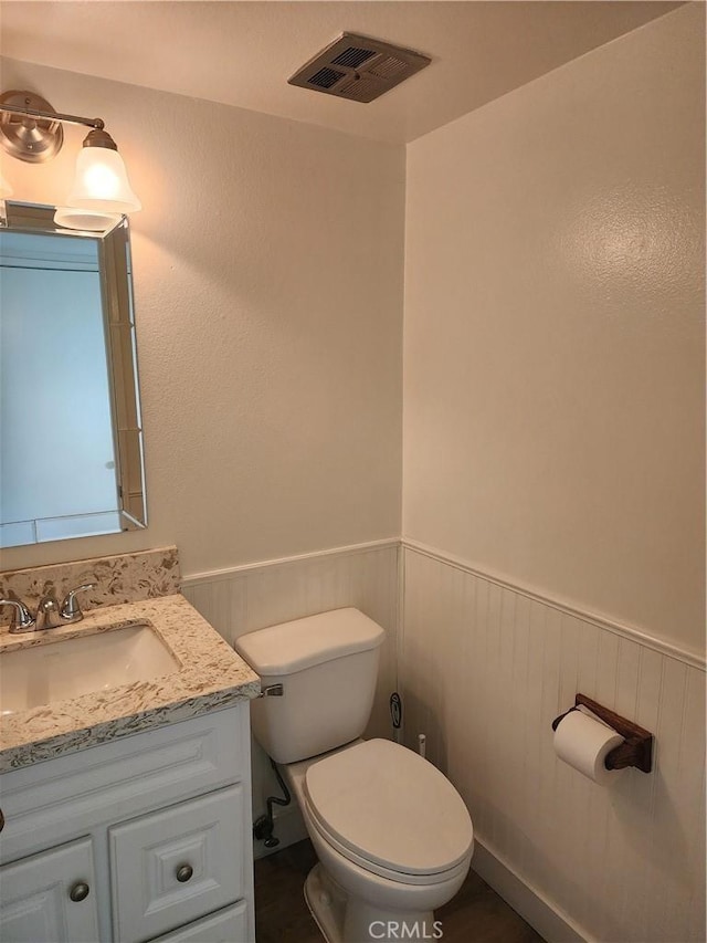 17077 Los Modelos St, Fountain Valley, CA 92708 - half bath with vanity and wainscoting