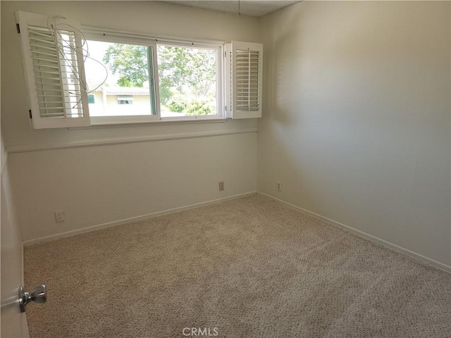 17077 Los Modelos St, Fountain Valley, CA 92708 - empty room featuring carpet and baseboards