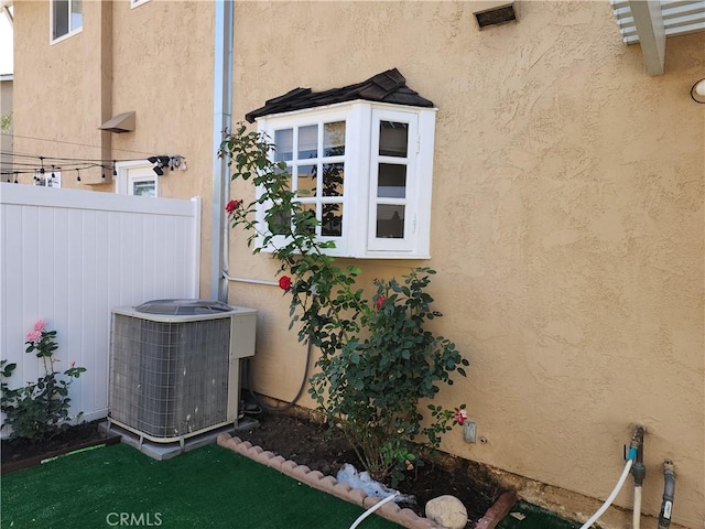 17077 Los Modelos St, Fountain Valley, CA 92708 - exterior view of stucco siding and a cooling unit