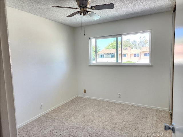 17077 Los Modelos St, Fountain Valley, CA 92708 - empty room featuring a textured ceiling, carpet flooring, and ceiling fan