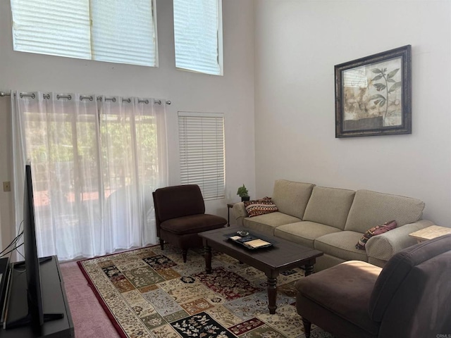 1826 Via Cuarto, Oceanside, CA 92056 - carpeted living area featuring healthy amount of natural light and a towering ceiling