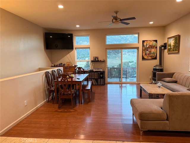 1324 Pinetree Dr, Frazier Park, CA 93225 - living area featuring a ceiling fan, wood finished floors, a wood stove, and recessed lighting