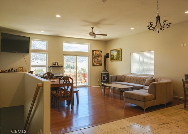 1324 Pinetree Dr, Frazier Park, CA 93225 - living room featuring ceiling fan, a wood stove, recessed lighting, and light wood-style flooring