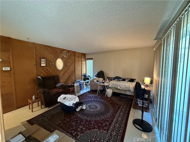 1817 E Grand Ave Unit 49, Escondido, CA 92027 - living area with wood walls and a textured ceiling