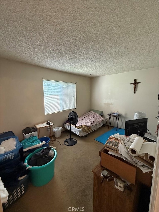 1817 E Grand Ave Unit 49, Escondido, CA 92027 - bedroom featuring a textured ceiling and carpet flooring