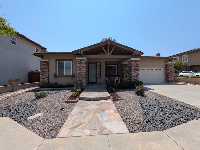 2706 Valleycreek Cir, Chula Vista, CA 91914 - view of front of home featuring stucco siding, a garage, driveway, and a porch