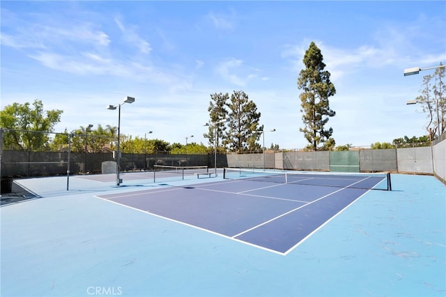 45 Bramble Ln Unit 109, Aliso Viejo, CA 92656 - view of tennis court with community basketball court