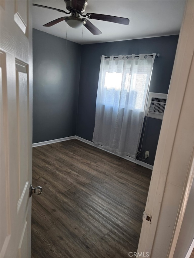 625 Xenia Ave, Beaumont, CA 92223 - empty room with dark wood finished floors and ceiling fan