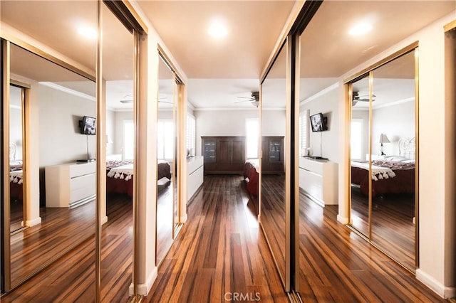 5440 Lindley Ave Unit 310, Encino, CA 91316 - hallway featuring ornamental molding and dark wood-style flooring