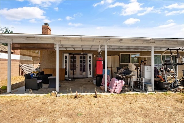 1062 Golden Rain St, Upland, CA 91786 - back of house with french doors, a patio area, and a chimney
