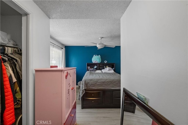 1062 Golden Rain St, Upland, CA 91786 - bedroom with wood finished floors, a textured ceiling, ceiling fan, and a closet