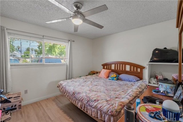1062 Golden Rain St, Upland, CA 91786 - bedroom with light wood finished floors, a textured ceiling, and ceiling fan