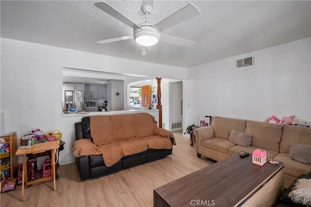 1062 Golden Rain St, Upland, CA 91786 - living room featuring light wood-style flooring and a ceiling fan