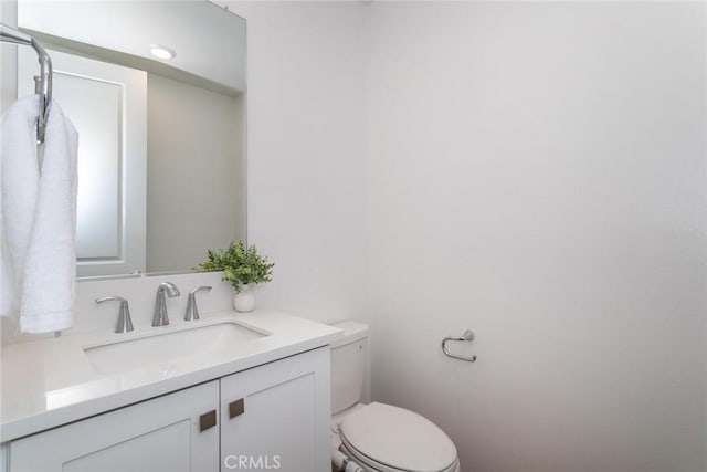 27554 Sparrow Ct, Valencia, CA 91381 - half bath featuring vanity and toilet