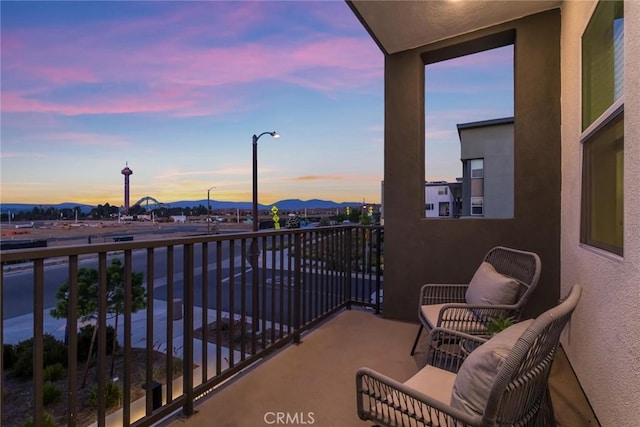 27554 Sparrow Ct, Valencia, CA 91381 - balcony at dusk with a mountain view