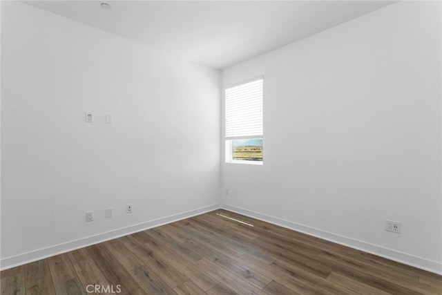 27554 Sparrow Ct, Valencia, CA 91381 - unfurnished room featuring dark wood-style flooring