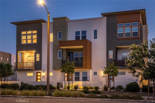 27554 Sparrow Ct, Valencia, CA 91381 - view of front of home with stucco siding