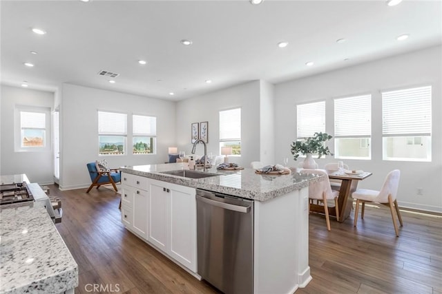 27554 Sparrow Ct, Valencia, CA 91381 - kitchen featuring dishwasher, white cabinets, recessed lighting, wood finished floors, and an island with sink