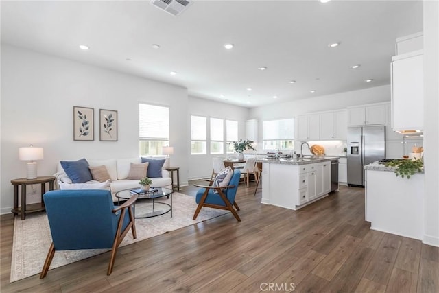 27554 Sparrow Ct, Valencia, CA 91381 - living area with wood finished floors and recessed lighting