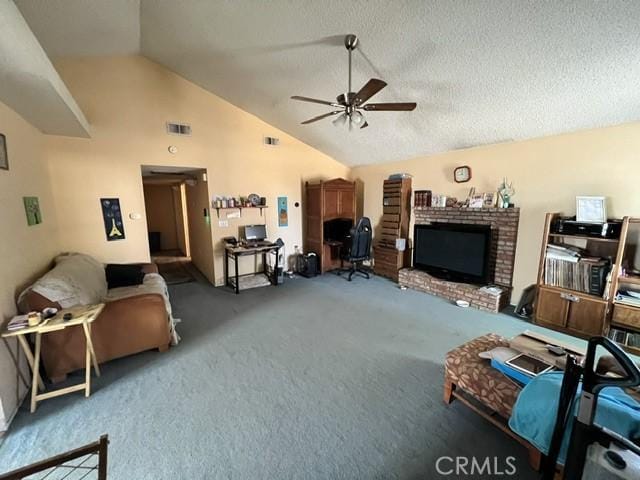 7512 Xavier Ave, California City, CA 93505 - living room with carpet floors, lofted ceiling, a ceiling fan, a brick fireplace, and a textured ceiling