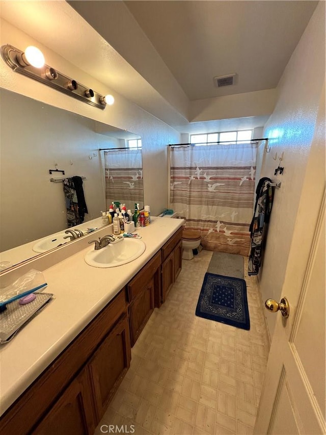 7512 Xavier Ave, California City, CA 93505 - bathroom featuring vanity and shower / bath combo