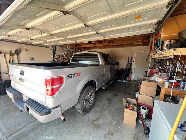 7512 Xavier Ave, California City, CA 93505 - garage with fridge