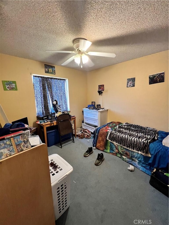 7512 Xavier Ave, California City, CA 93505 - carpeted bedroom featuring a textured ceiling and ceiling fan