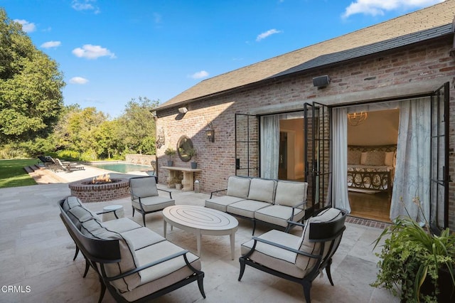 1370 Hillcrest Ave, Pasadena, CA 91106 - view of patio featuring an outdoor living space with a fire pit