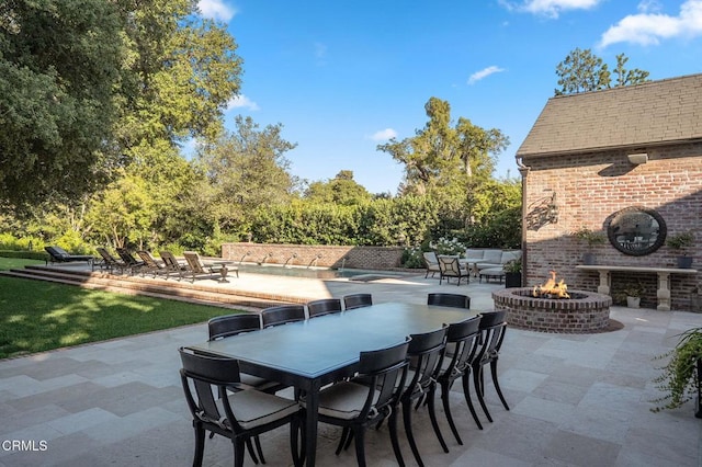 1370 Hillcrest Ave, Pasadena, CA 91106 - view of patio / terrace with outdoor dining space and a fire pit