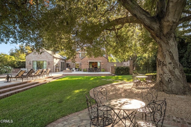 1370 Hillcrest Ave, Pasadena, CA 91106 - view of green lawn featuring a patio area