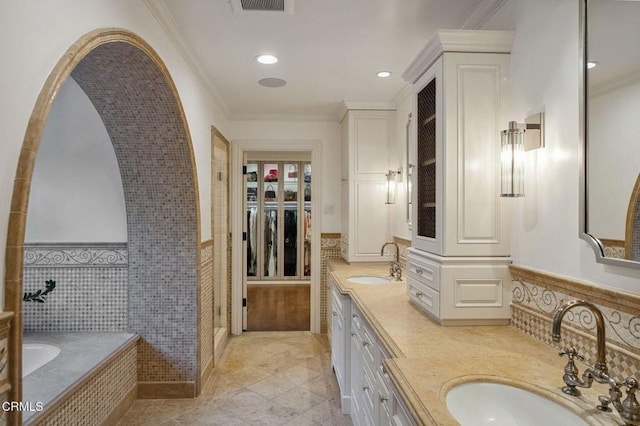 1370 Hillcrest Ave, Pasadena, CA 91106 - bathroom with double vanity, a bath, ornamental molding, tile patterned flooring, and wainscoting