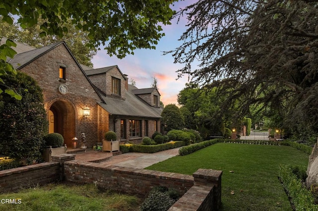 1370 Hillcrest Ave, Pasadena, CA 91106 - rear view of property with a yard and brick siding