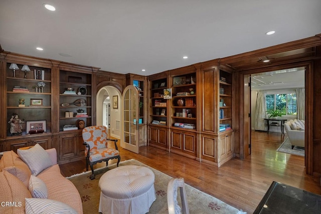 1370 Hillcrest Ave, Pasadena, CA 91106 - living area featuring arched walkways, recessed lighting, light wood-style flooring, and built in features