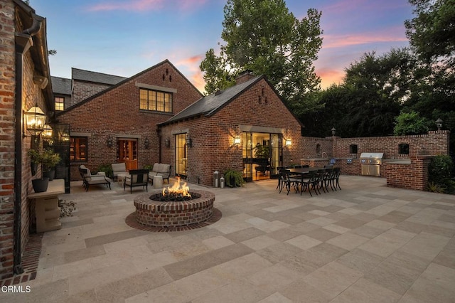 1370 Hillcrest Ave, Pasadena, CA 91106 - view of patio with area for grilling and an outdoor fire pit