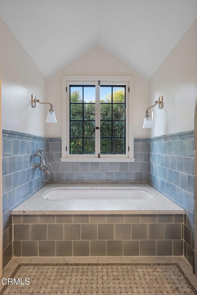 1370 Hillcrest Ave, Pasadena, CA 91106 - bathroom featuring lofted ceiling, a garden tub, tile walls, and wainscoting
