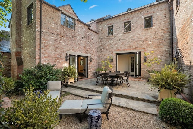 1370 Hillcrest Ave, Pasadena, CA 91106 - back of property with a patio area and brick siding