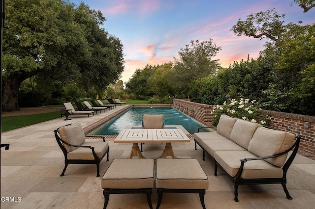 1370 Hillcrest Ave, Pasadena, CA 91106 - outdoor pool featuring outdoor lounge area, a patio, and view of wooded area