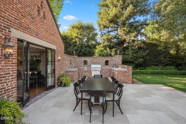 1370 Hillcrest Ave, Pasadena, CA 91106 - view of patio with an outdoor kitchen and outdoor dining space