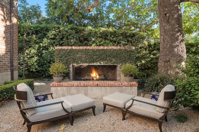 1370 Hillcrest Ave, Pasadena, CA 91106 - view of patio with a warm lit fireplace