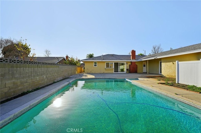 1472 N San Antonio Ave, Upland, CA 91786 - view of swimming pool featuring a fenced backyard and a patio