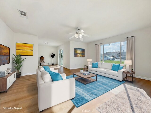1472 N San Antonio Ave, Upland, CA 91786 - living room with wood finished floors and a ceiling fan