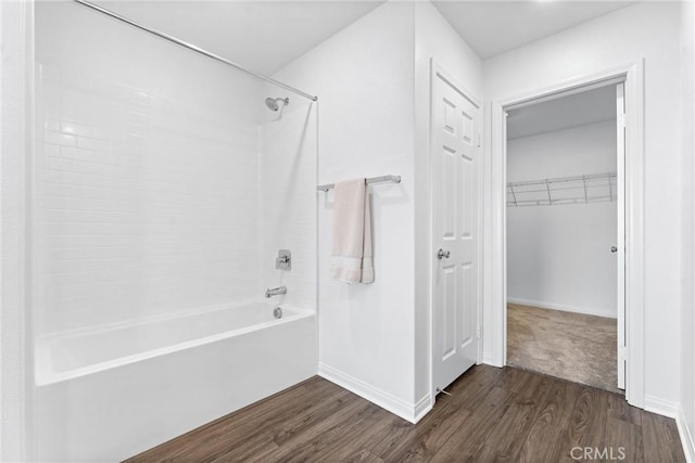 14053 Spurlock Ln Unit 3, Gardena, CA 90247 - bathroom featuring washtub / shower combination, wood finished floors, and a spacious closet