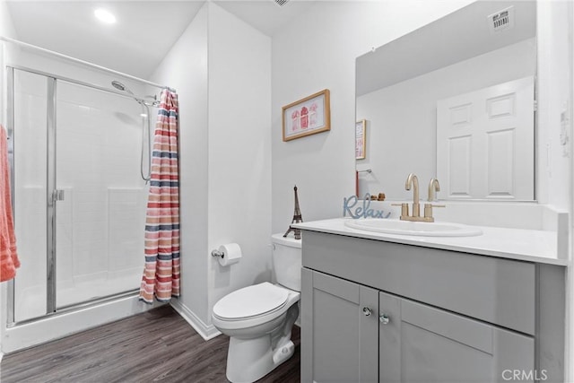14053 Spurlock Ln Unit 3, Gardena, CA 90247 - bathroom featuring vanity, a stall shower, and wood finished floors