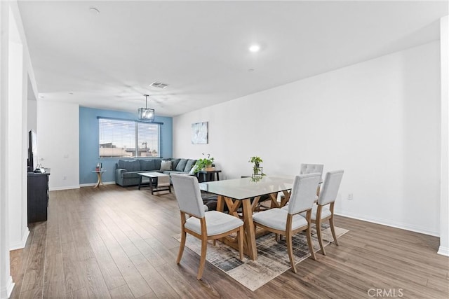 14053 Spurlock Ln Unit 3, Gardena, CA 90247 - dining room featuring wood finished floors