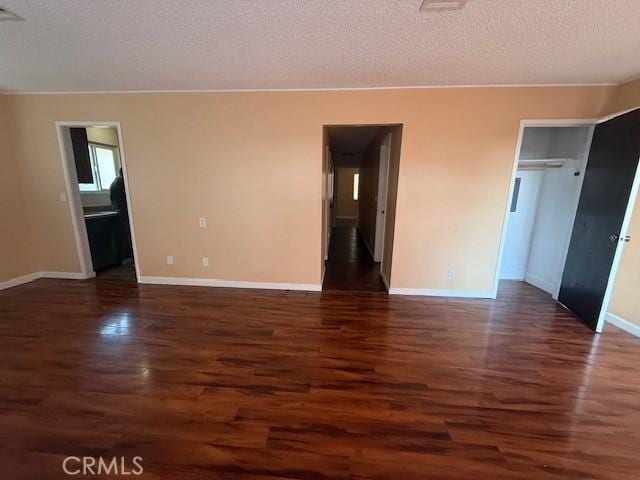 444 Corcoran Ave Unit 4, Vallejo, CA 93536 - empty room with dark wood finished floors and a textured ceiling