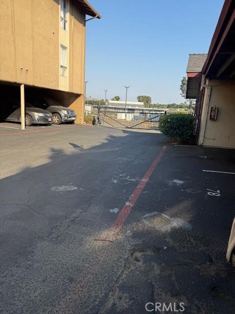 444 Corcoran Ave Unit 4, Vallejo, CA 93536 - covered parking lot featuring a gate